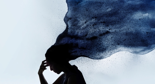 Abstract art of a woman deep in thought while the back of her head fades into dust upwards, looking like flowing long hair, depicting depression.